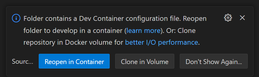 Screenshot showing VS Code prompt to open the repository inside a container.
