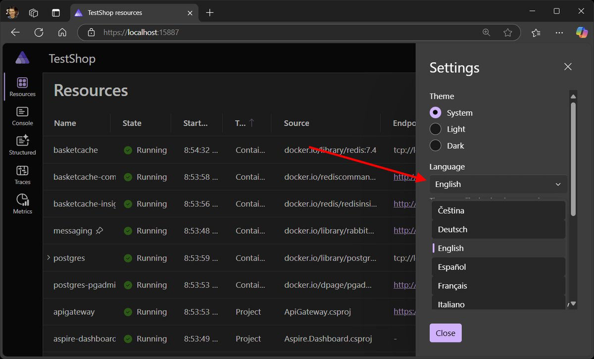 A screenshot of the Aspire dashboard showing the new flyout menu to change language